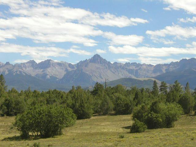 Lot#12 Mcclure Road Ridgway, CO 81432 - Photo 9 of 9 a view of a lake with mountains in the background