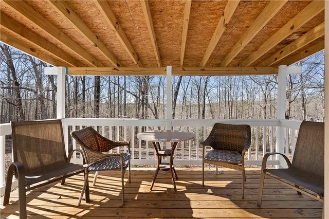 a view of an empty room with windows