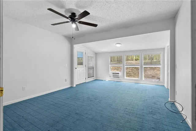 a view of an entryway with a livingroom