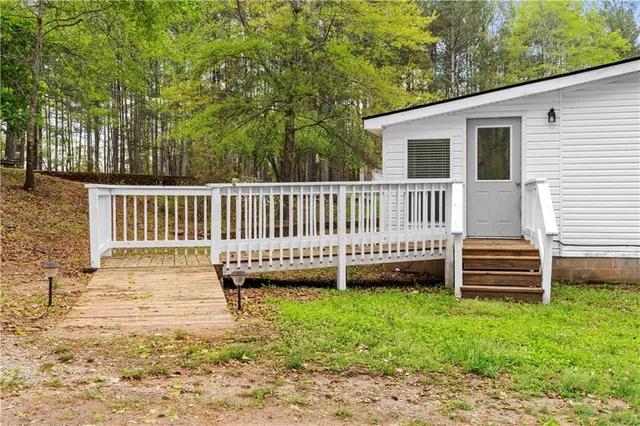 a view of a deck with a yard