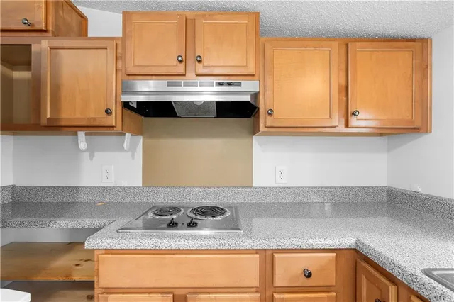 a backyard of a house with outdoor seating