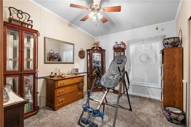 a view of a house with backyard and garden