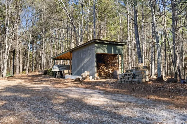 a view of a kitchen with workspace and a window