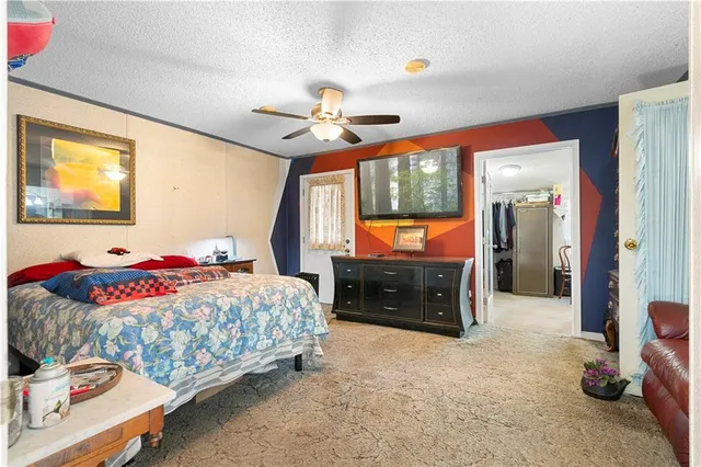 a view of a car park in front of house