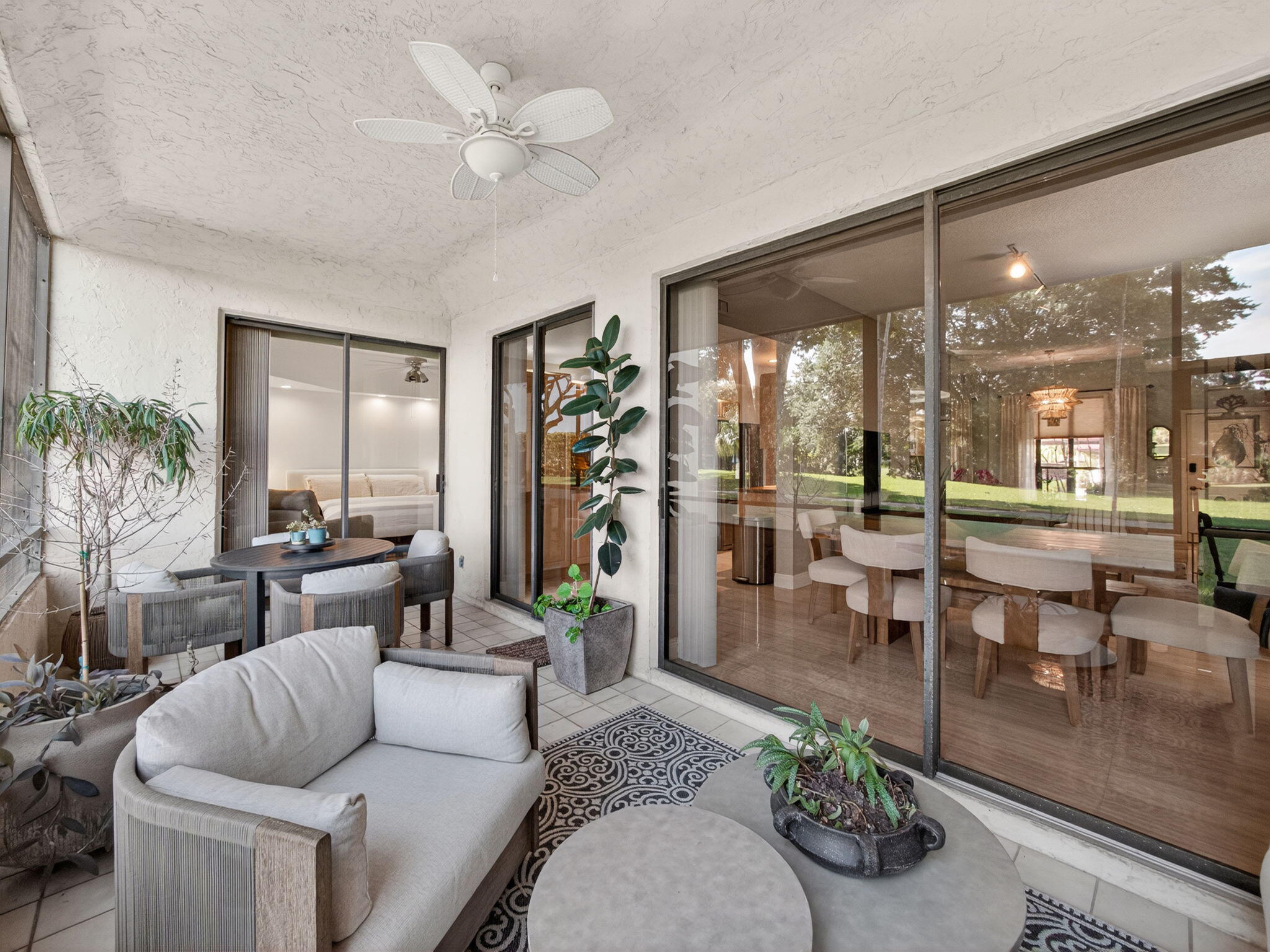 7472 La Paz Boulevard, Unit 109 Boca Raton, FL 33433 - Photo 22 of 29 a living room with furniture and a large window