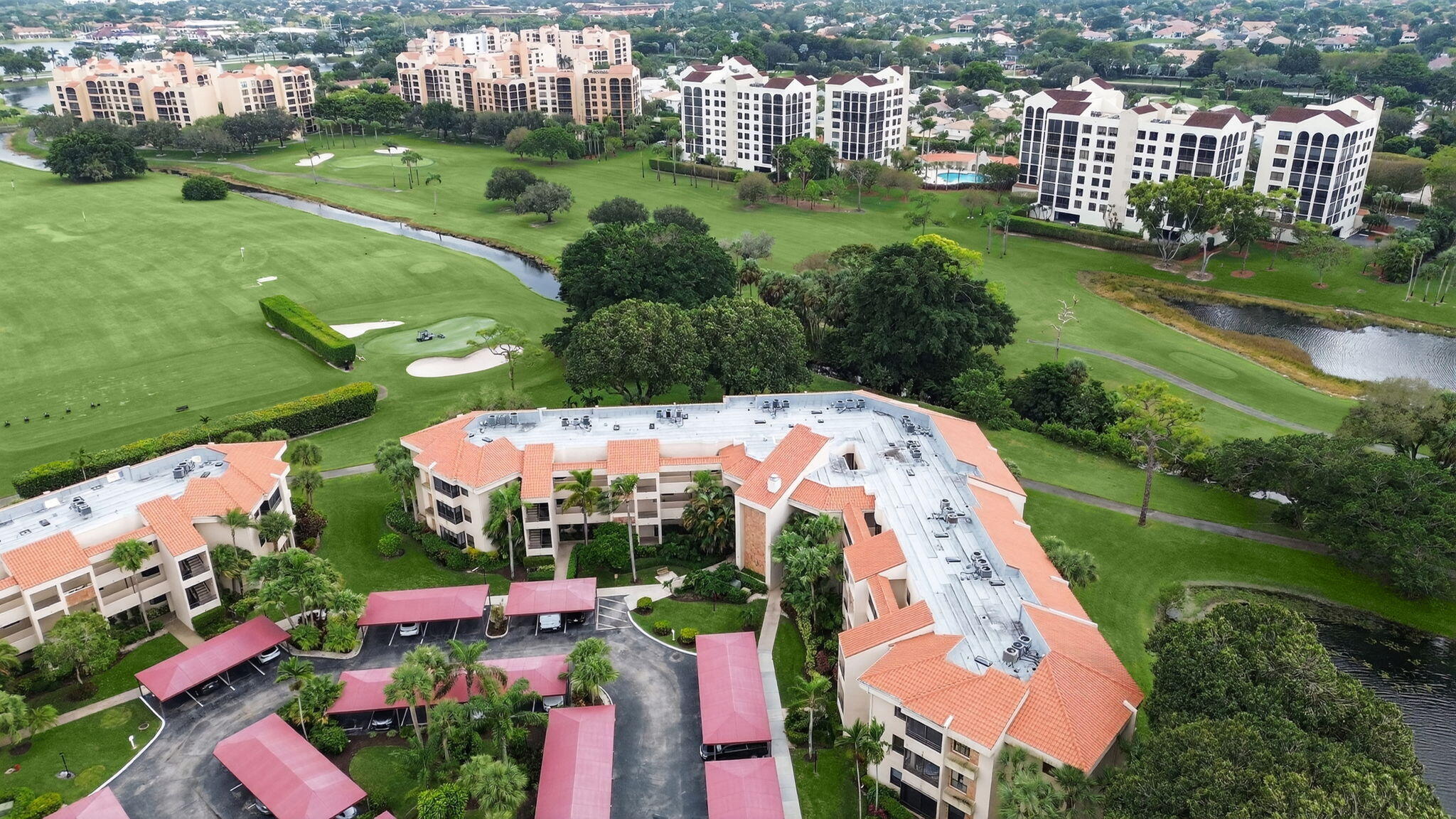7472 La Paz Boulevard, Unit 109 Boca Raton, FL 33433 - Photo 27 of 29 an aerial view of a city