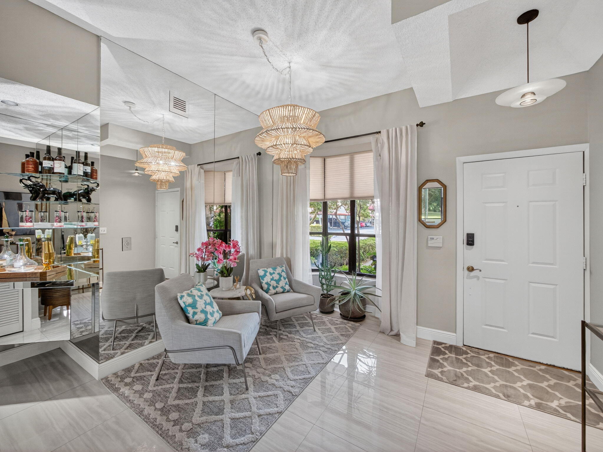 7472 La Paz Boulevard, Unit 109 Boca Raton, FL 33433 - Photo 5 of 29 a view of a dining room with furniture window and wooden floor