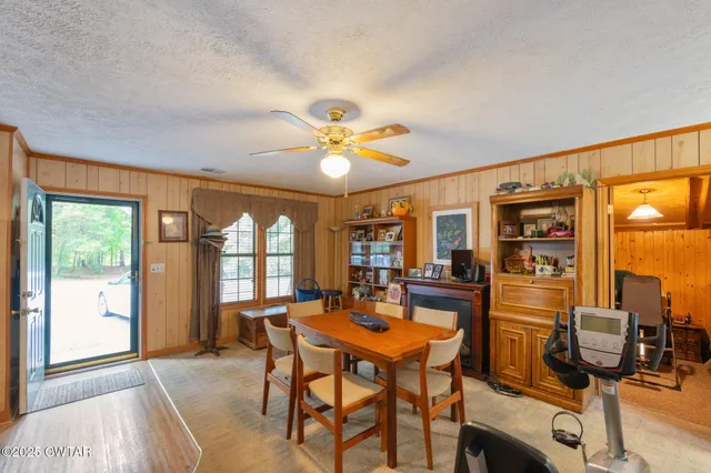 a bathroom with a shower and a toilet