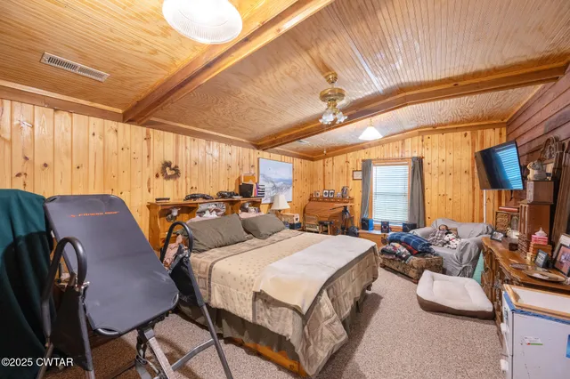 a view of a porch with wooden floor