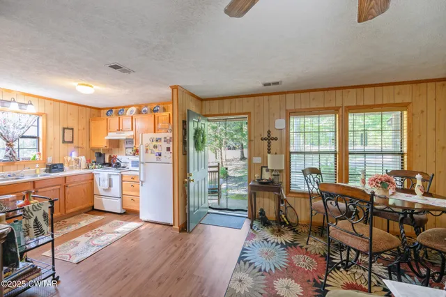 a view of balcony with furniture