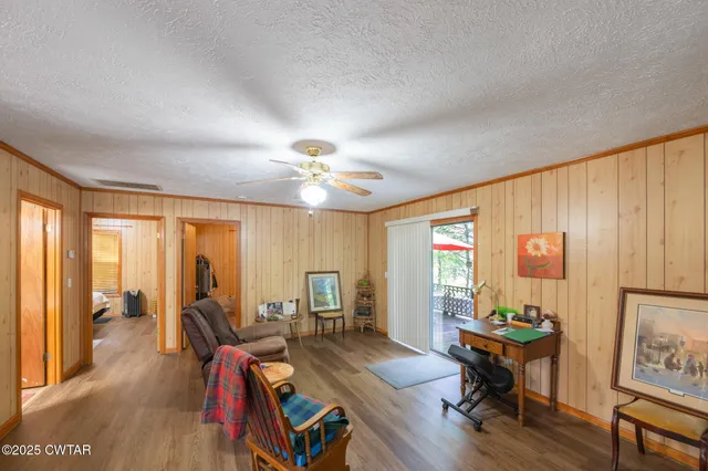 a bathroom with a sink a mirror and a shower curtain