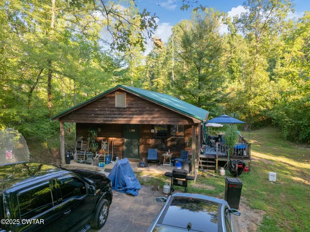 a front view of a house with yard