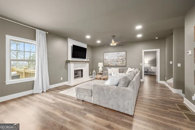 a view of a patio with chairs and table