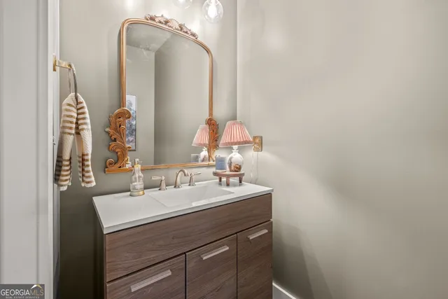 a workspace with wooden floor and a window