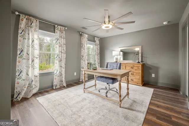 a bathroom with a sink a mirror and a toilet