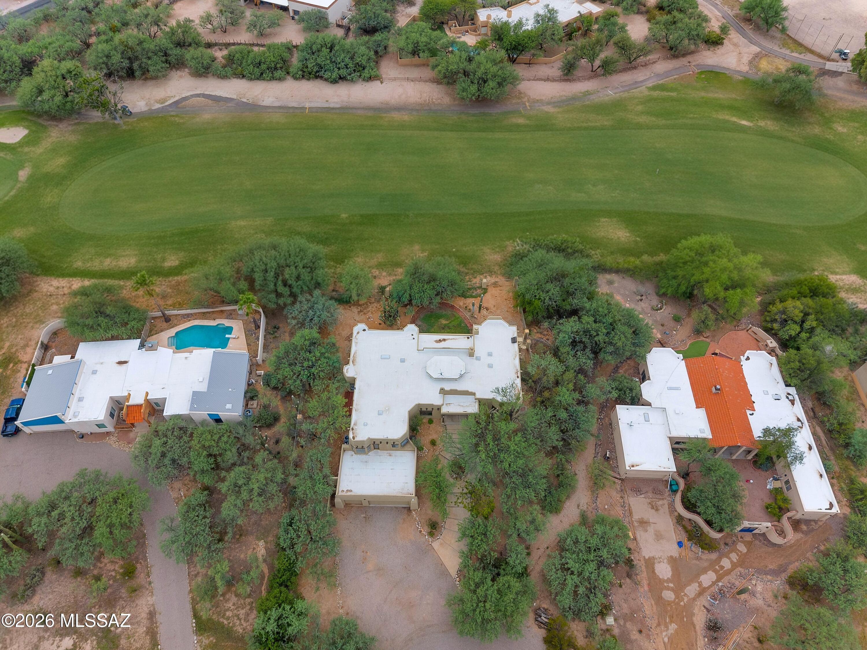 12160 East Tanque Verde Road Tucson, AZ 85749 - Photo 38 of 53 Property positioned along the adjacent golf course fairway, with mountain views.