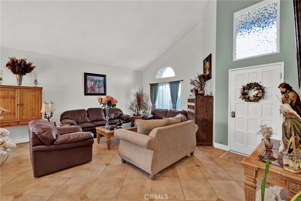 3350 May Court Riverside, CA 92503 - Photo 31 of 55 a living room with furniture a couch and a window