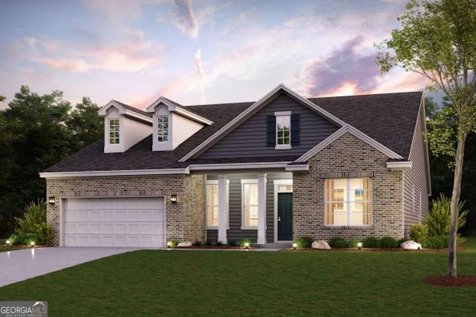 front view of a house with a yard