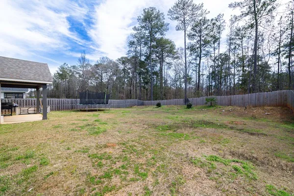 a bathroom with a sink and a yard