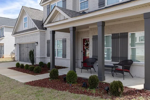 a view of a house with a patio