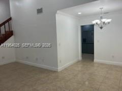 1680 Northeast 5th Street Homestead, FL 33033 - Photo 6 of 26 wooden floor in an empty room