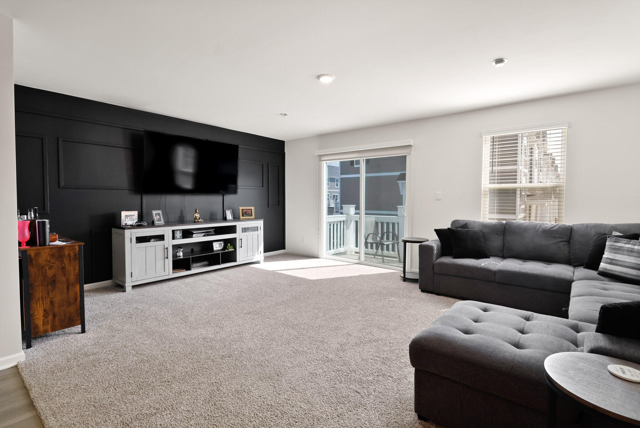 10743 Violette Way St. John, IN 46373 - Photo 12 of 23 a living room with furniture and a flat screen tv