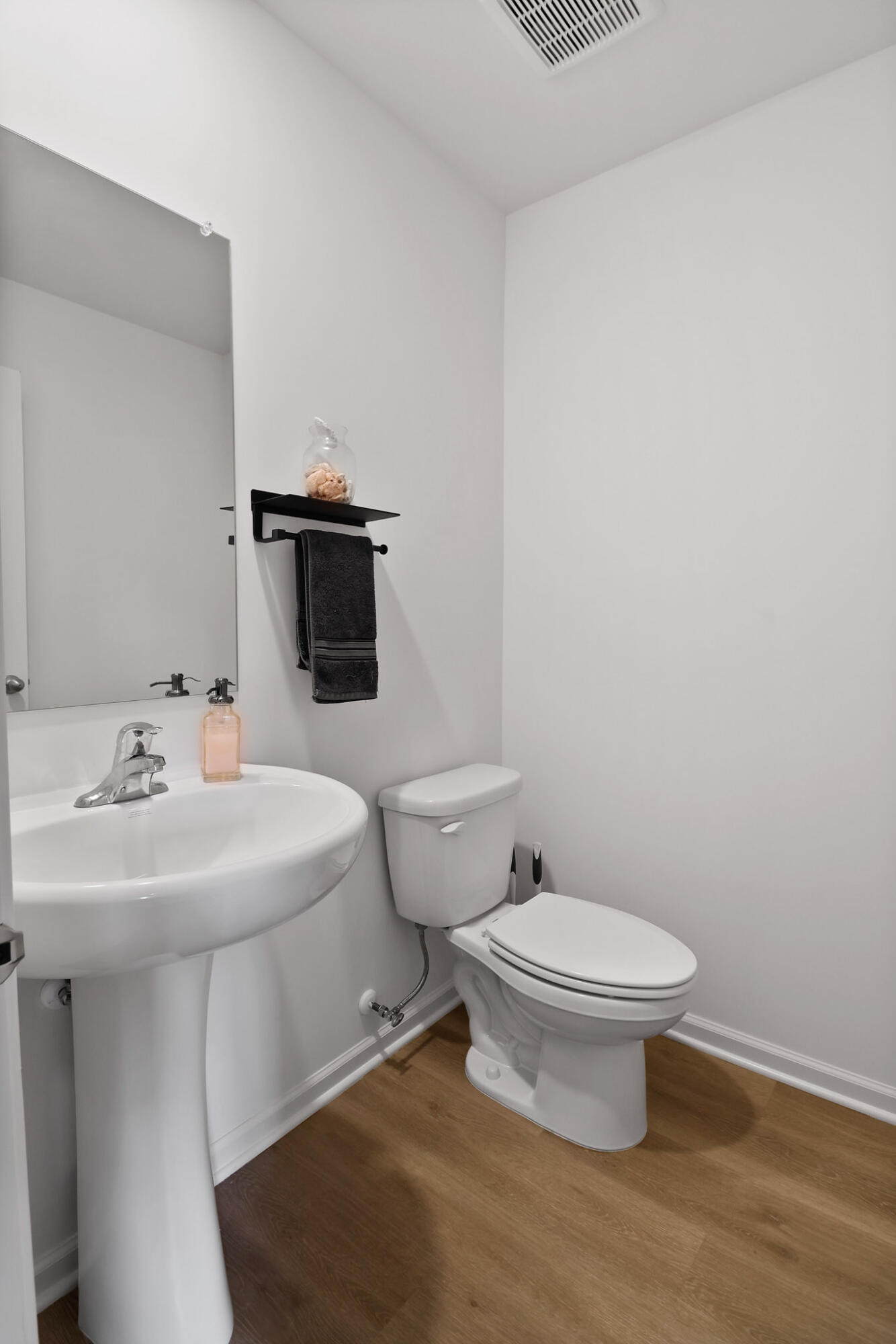 10743 Violette Way St. John, IN 46373 - Photo 13 of 23 a bathroom with a sink and a toilet