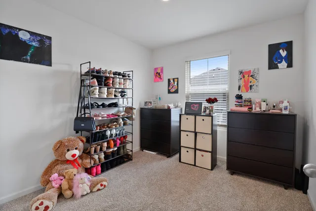 a front view of a building with garden