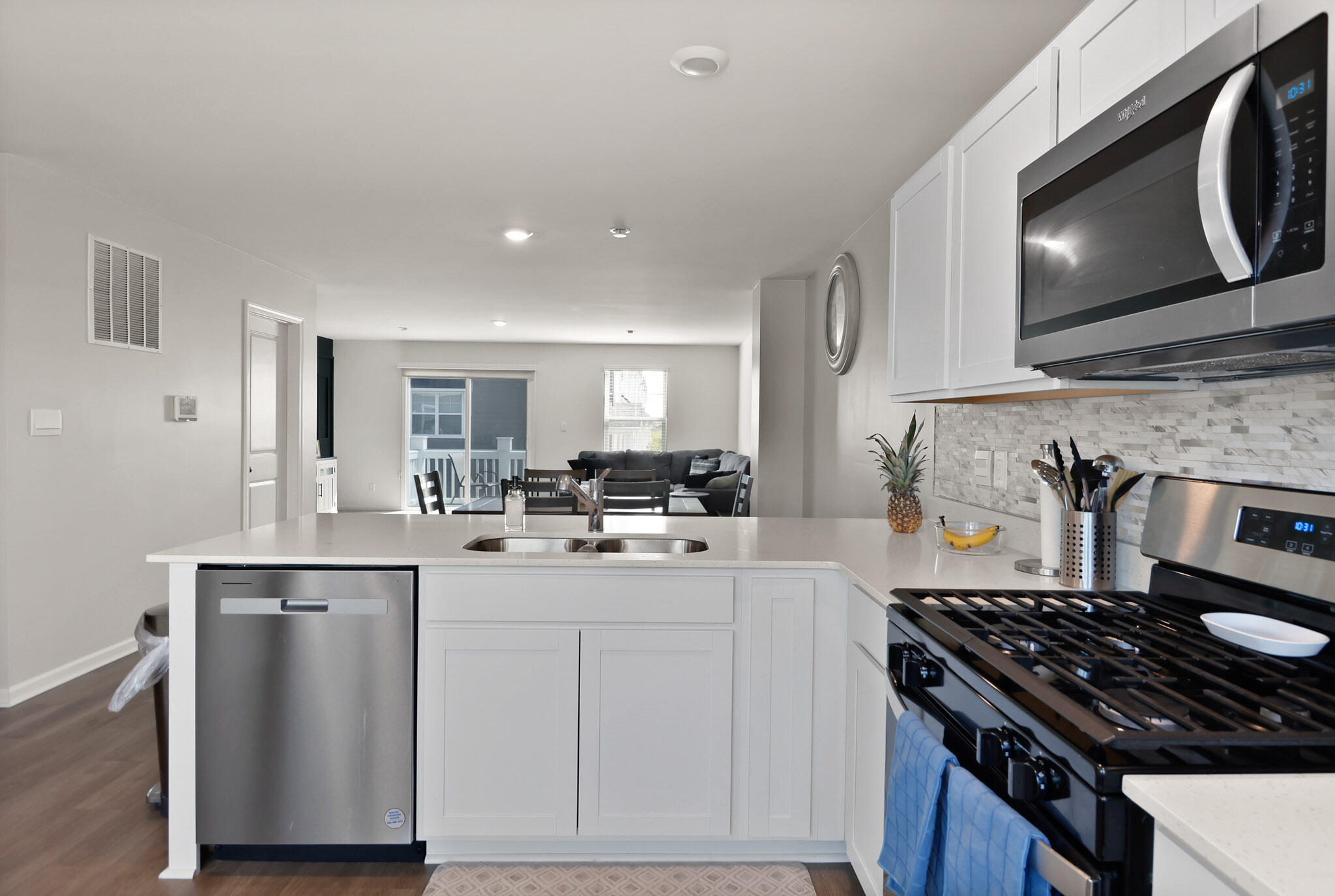 10743 Violette Way St. John, IN 46373 - Photo 9 of 23 a kitchen with a stove and a microwave