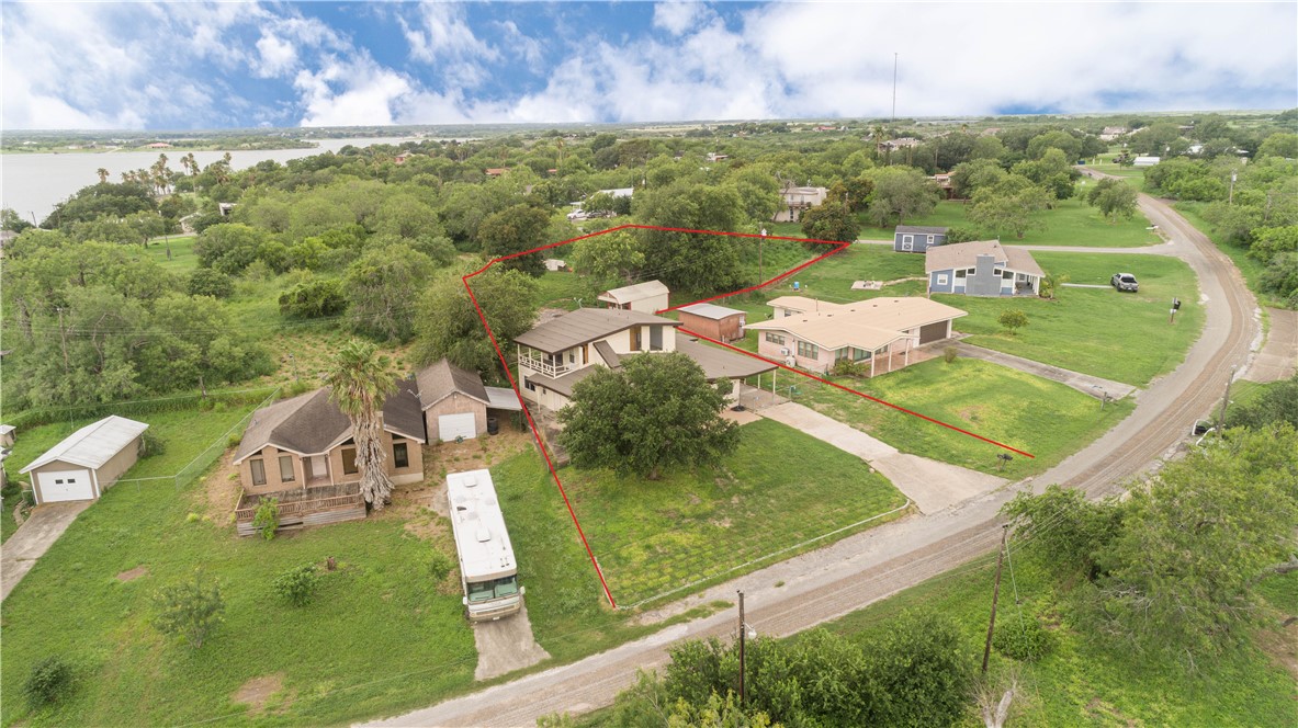 143 Trail Ridge Drive Sandia, TX 78383 - Photo 3 of 40 an aerial view of a house with a yard