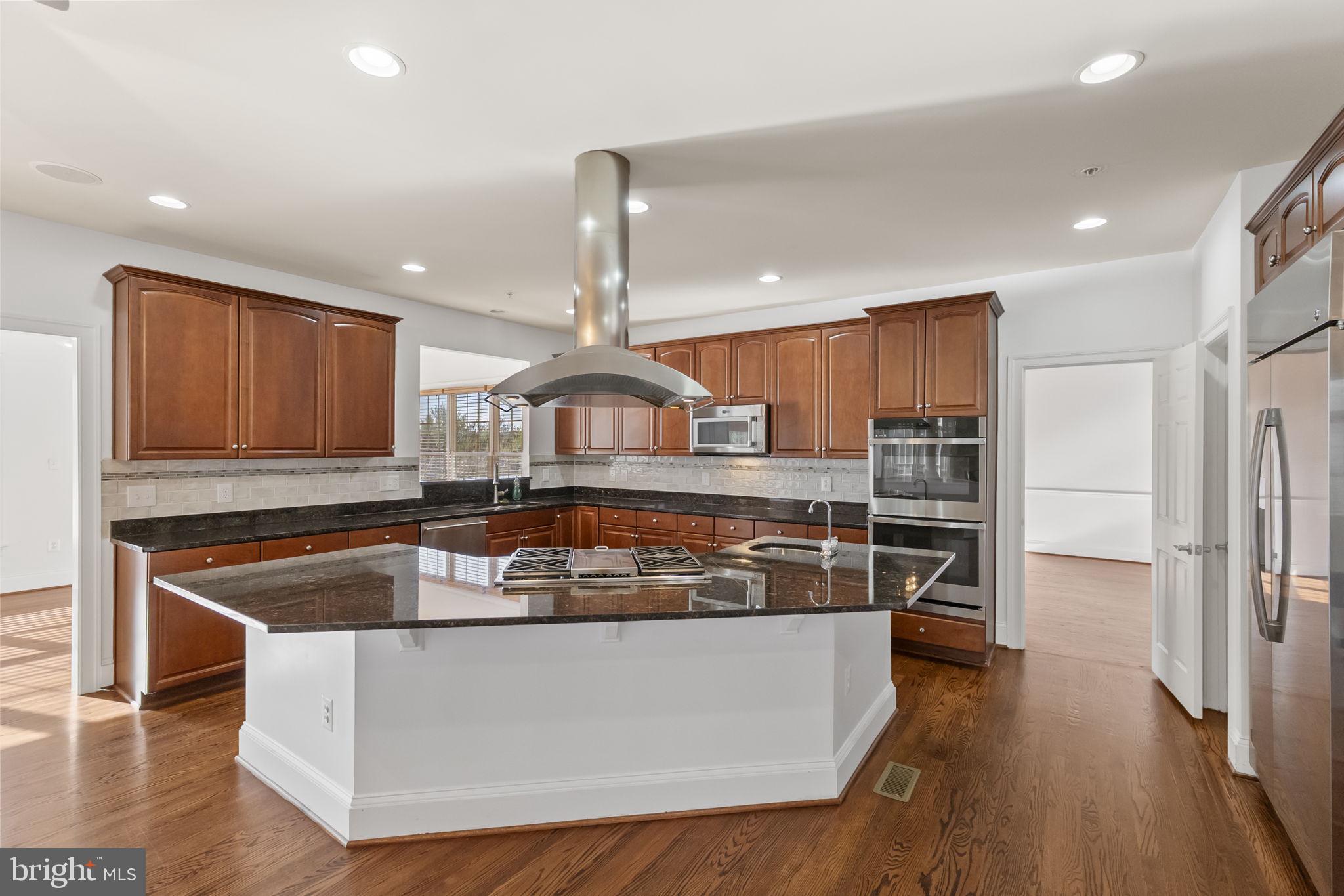 11902 Piedmont Road Clarksburg, MD 20871 - Photo 2 of 64 Enjoy meal prep in the gourmet kitchen