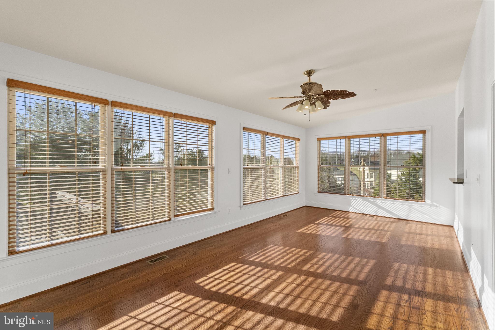 11902 Piedmont Road Clarksburg, MD 20871 - Photo 6 of 64 Soak up the natural light in the sun room