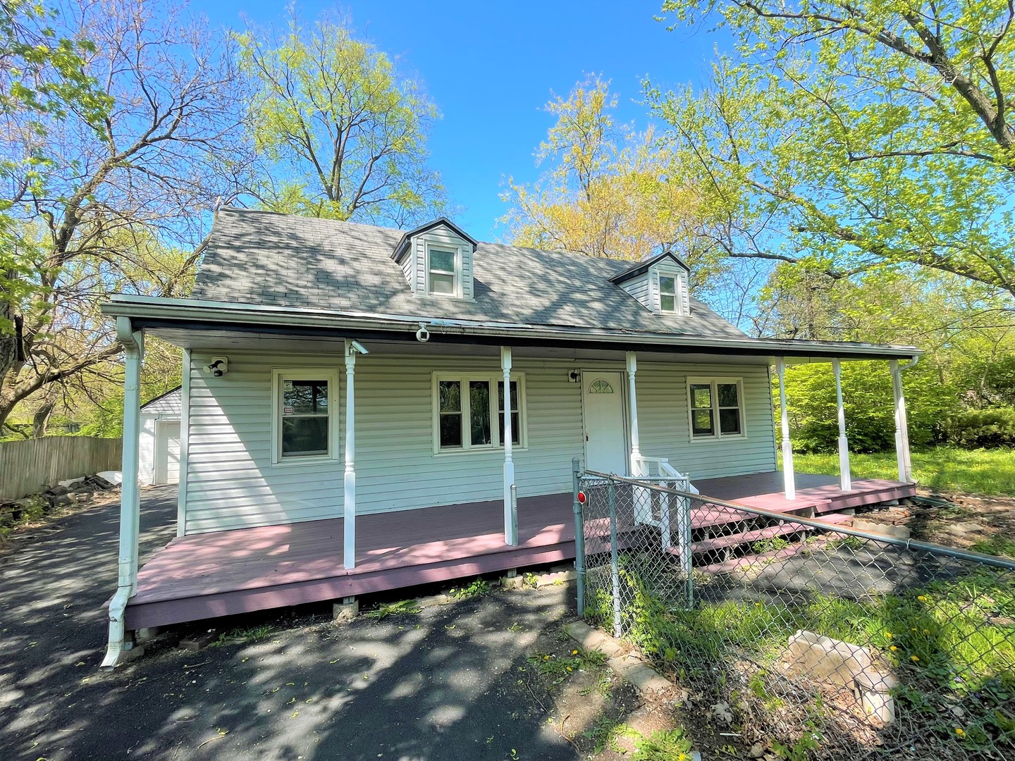 1119 New Lenox Road Joliet, IL 60433 - Photo 10 of 10 a view of a house with a backyard and sitting area