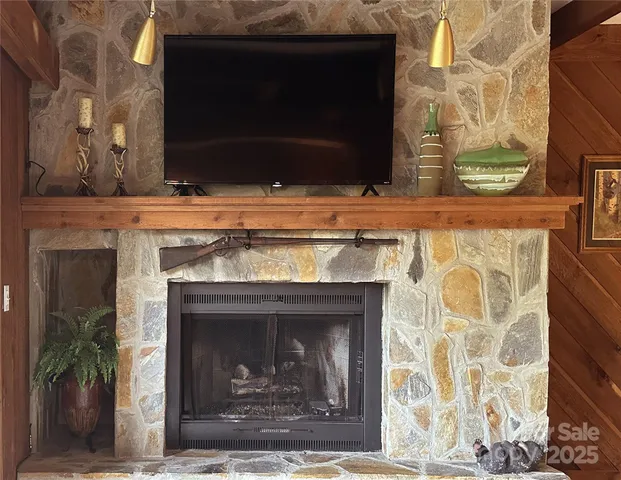 a fireplace with a clock on top of it