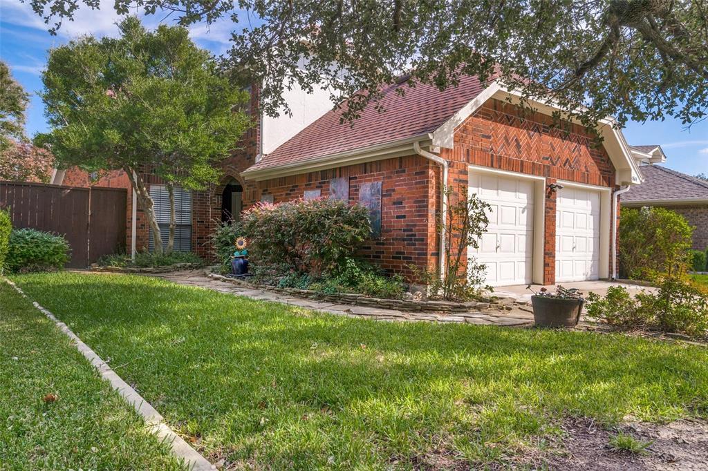 6804 Century Circle Plano, TX 75023 - Photo 1 of 13 a view of a house with backyard and sitting area