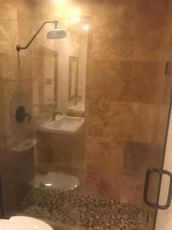 6804 Century Circle Plano, TX 75023 - Photo 13 of 13 a bathroom with a shower