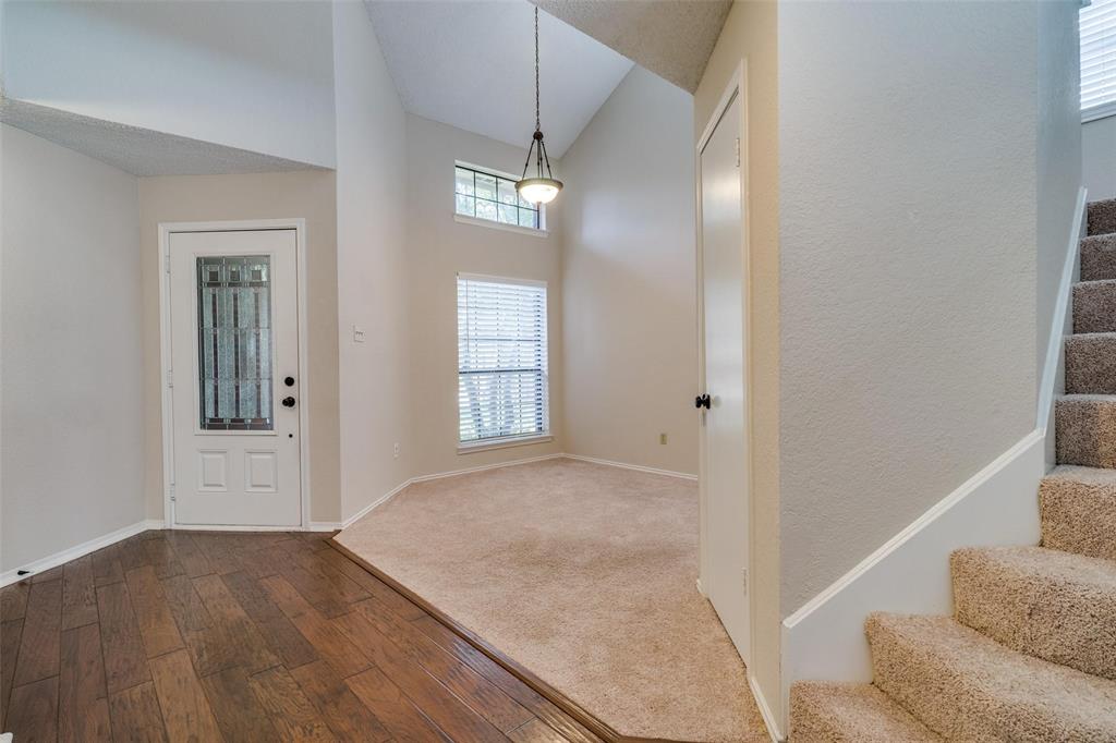 6804 Century Circle Plano, TX 75023 - Photo 3 of 13 wooden floor in an empty room with a window