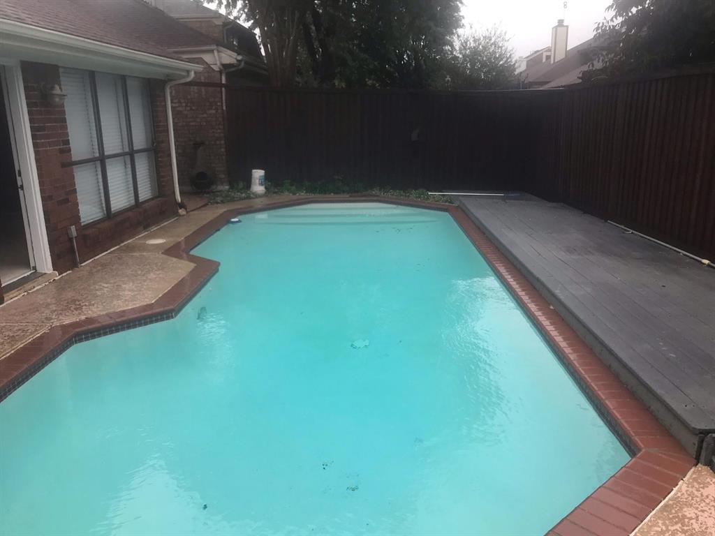 6804 Century Circle Plano, TX 75023 - Photo 9 of 13 a view of a backyard