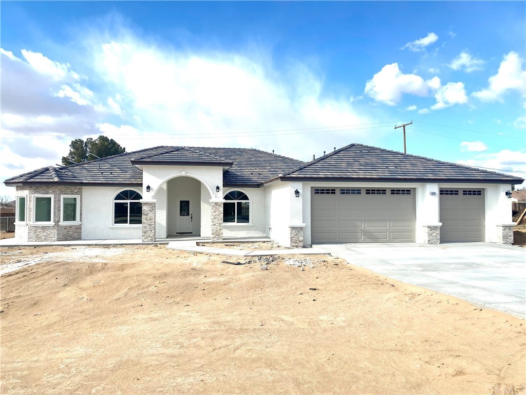 19188 Shoshonee Road Apple Valley, CA 92307 - Photo 1 of 1 a view of a house with a yard and chandelier