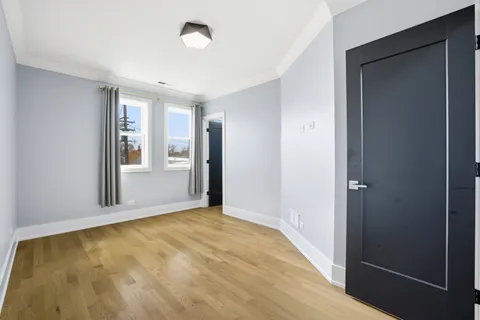 a bathroom with a bathtub shower sink vanity and toilet
