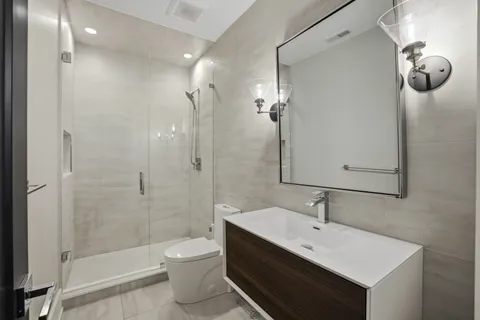 a utility room with sink dryer and washer