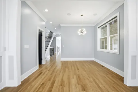 a view of livingroom with hardwood floor and a ceiling fan