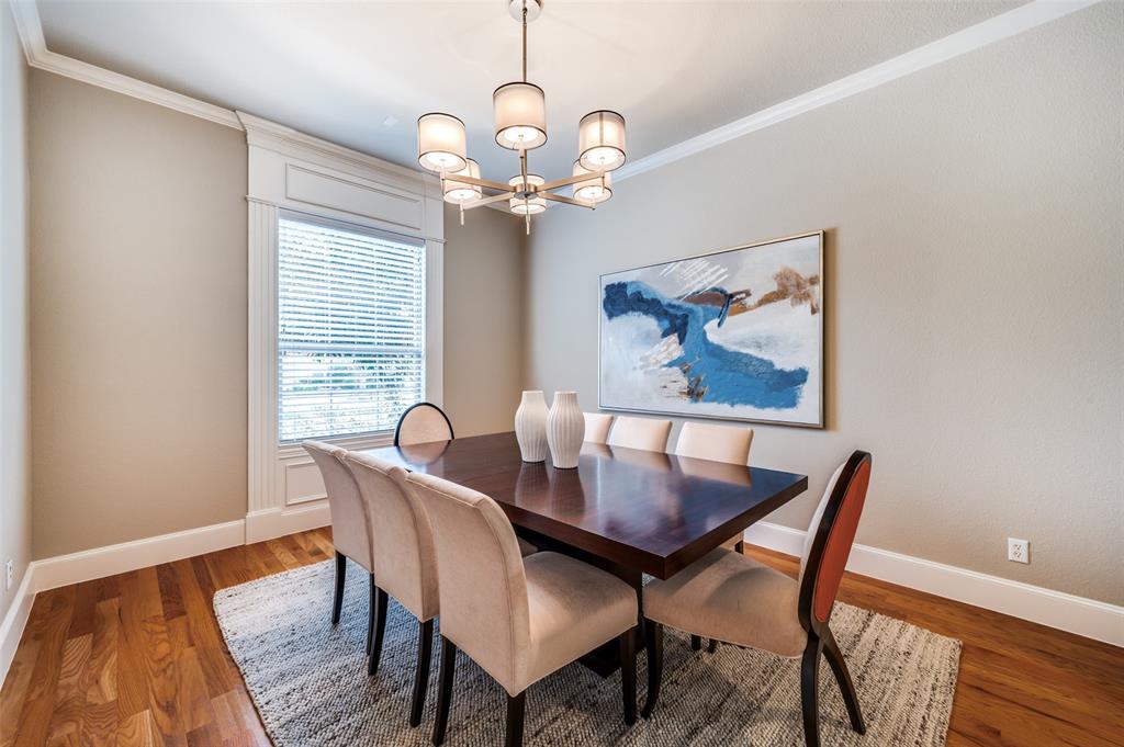 2168 Dampton Drive Frisco, TX 75033 - Photo 11 of 31 a view of a dining room with furniture wooden floor and a chandelier