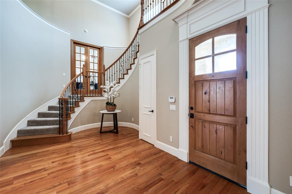 2168 Dampton Drive Frisco, TX 75033 - Photo 2 of 31 a view of entryway with wooden floor and stairs