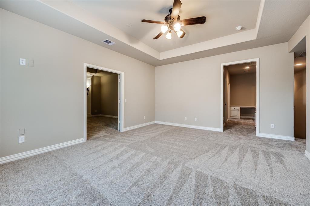 2168 Dampton Drive Frisco, TX 75033 - Photo 22 of 31 an empty room with fan and entrance