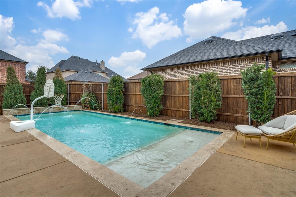 2168 Dampton Drive Frisco, TX 75033 - Photo 26 of 31 a view of a patio with couches plants and large tree