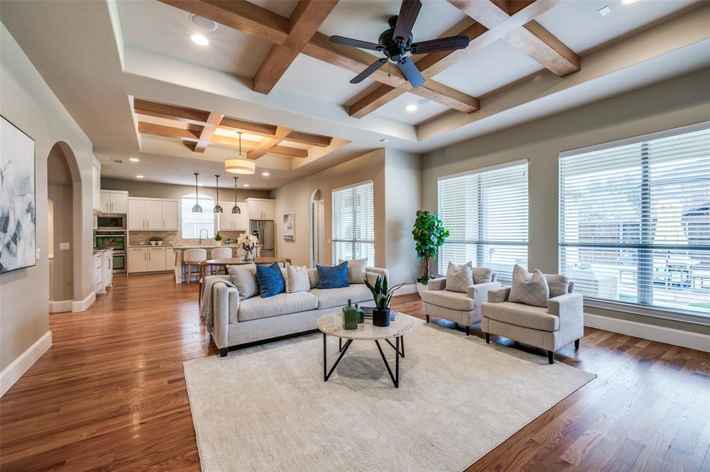 2168 Dampton Drive Frisco, TX 75033 - Photo 5 of 31 a living room with furniture and a large window with wooden floor