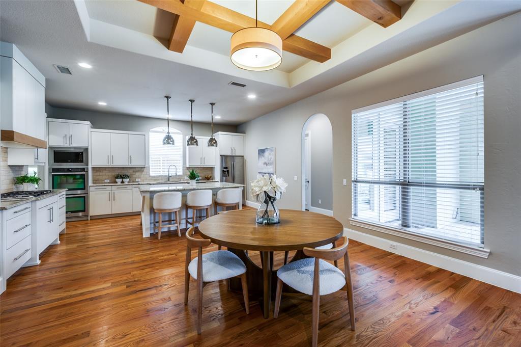 2168 Dampton Drive Frisco, TX 75033 - Photo 6 of 31 a view of a dining room with furniture window and wooden floor