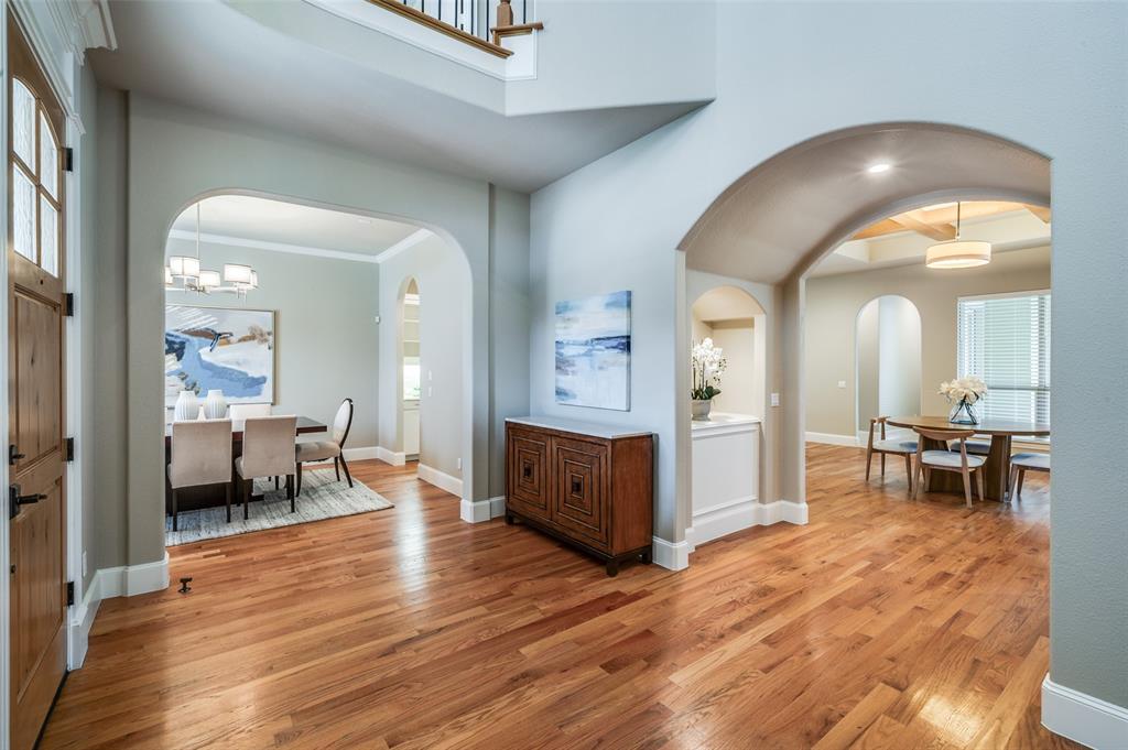 2168 Dampton Drive Frisco, TX 75033 - Photo 10 of 31 a living room with furniture and a wooden floor