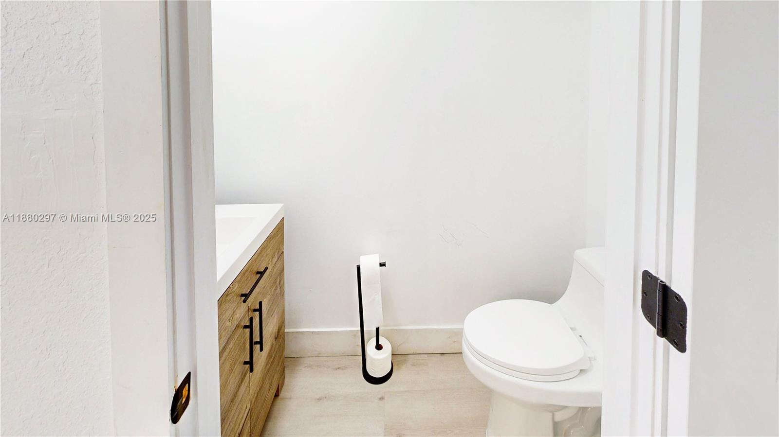 24902 Southwest 107th Avenue Homestead, FL 33032 - Photo 11 of 73 a bathroom with a toilet and shower